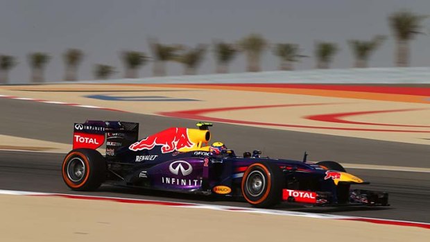Speeding on: Mark Webber prepares for the Bahrain formula one grand prix.