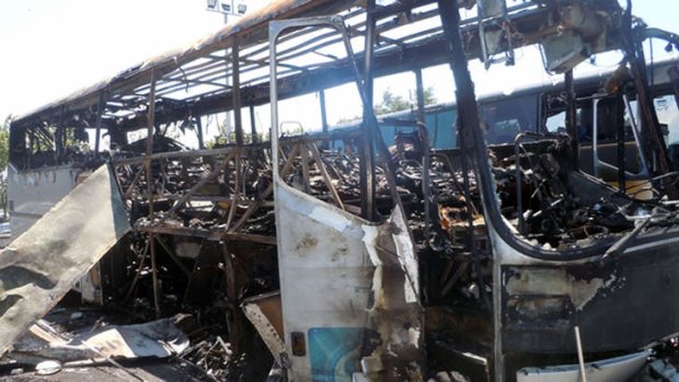 The wreckage of the bus  in Burgas after the suicide bombing attack, which killed five tourists, the driver and the bomber.