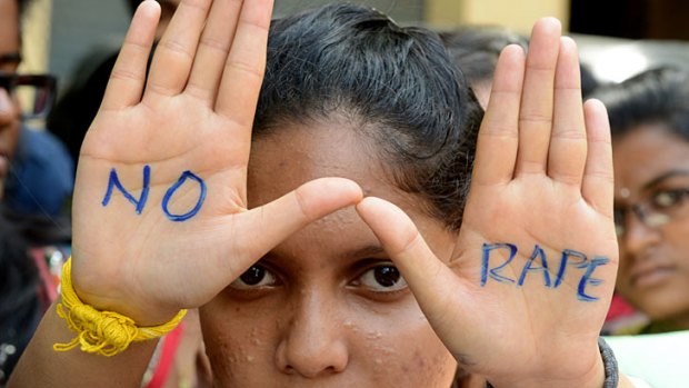 Indian students of Saint Joseph Degree college participate in an anti-rape protest in Hyderabad.