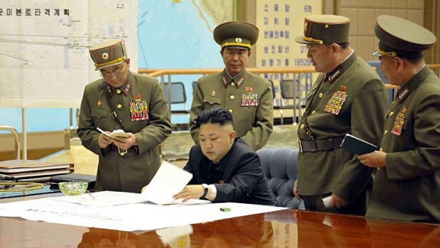 Sealing the deal: North Korean leader Kim Jong-un and his government have declared a 'state of war' with South Korea.