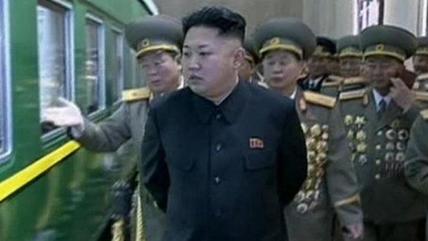 Train spotting: North Korean leader Kim Jong Un and officials visit a railway station.