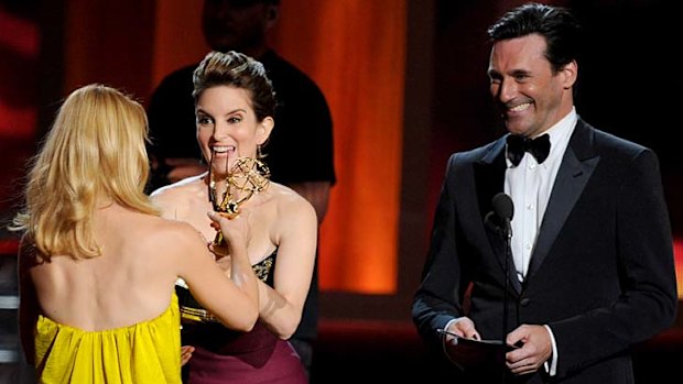 Brave face ... Jon Hamm looks on as Mad Men misses out on yet another award.