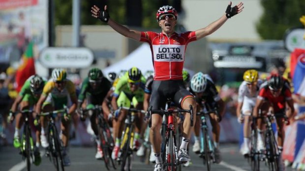 Tony Gallopin (Lotto Belisol) of France celebrates as his solo breakaway eludes the peloton in the final metres to win the eleventh stage of the 2014 Tour de France, a 188-kilometre stage between Besancon and Oyonnax.