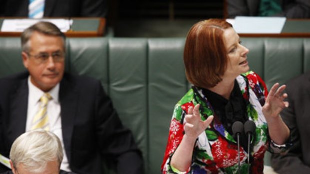 Julia Gillard brings several splashes of colour to the masculine sartorial wasteland that is parliamentary question time.