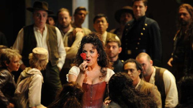 Nancy Fabiola Herrera as Carmen and the Opera Australia Chorus.