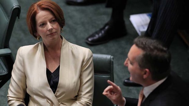 The blame game ... Julia Gillard and Chris Bowen.