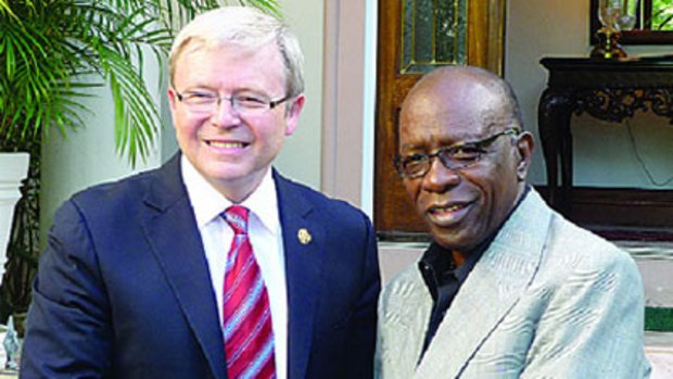 Jack Warner and former prime minister Kevin Rudd meet last year in Port of Spain.