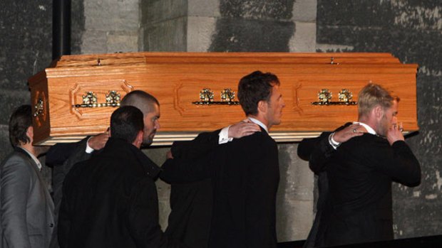Goodbye to a beloved bandmate and friend ... Boyzone’s Ronan Keating, right, helps  carry Stephen Gately’s coffin into St Laurence O’Toole Church, Dublin.