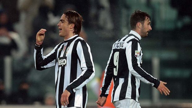 Juventus' forward Alessandro Matri (left) celebrates with teamate Mirko Vucinic after scoring.