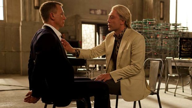 Javier Bardem, as Raoul Silva, interrogates Daniel Craig's Bond in a scene from <i>Skyfall</i>.