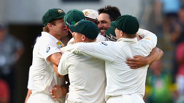 Mitchell Johnson celebrates taking the final wicket.