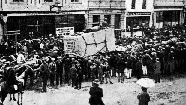 Blast from the past: Block of granite for Burke and Wills monument being hauled past <i>The Age</i> building in Elizabeth Street Melbourne. 