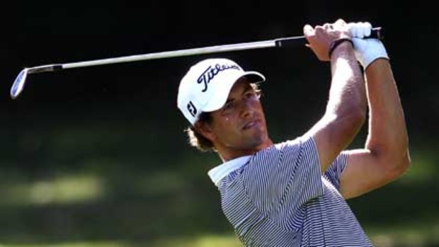 Adam Scott on his way towards a disappointing round of 75 at Coolum.
