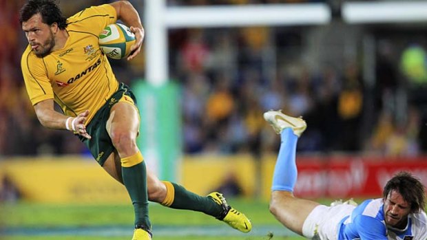 In a rush ... Adam Ashley-Cooper in action for the Wallabies against Argentina on the Gold Coast last Saturday night.