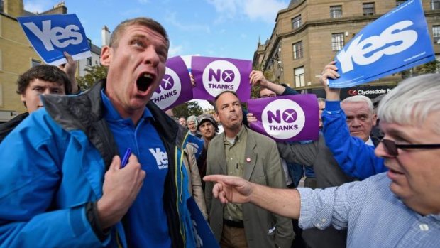 Campaigners exchange views in Dundee during a rally in the lead-up to the referendum on Thursday.