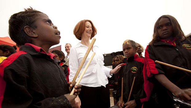 Julia Gillard this week with members of the Alice Springs children's drumming group.