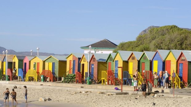 Easy does it ... beach huts line the shore.