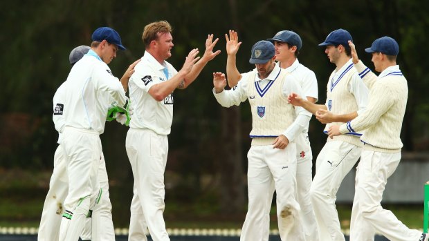 Back in the frame:  NSW fast bowler Doug Bollinger celebrates a wicket.