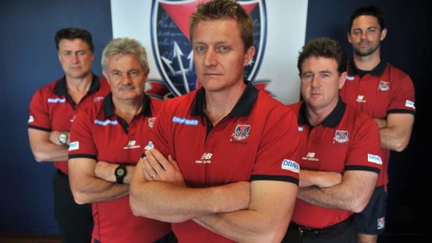 Neil Craig, second from left and Chris Connolly, second from right, as part of former coach Mark Neeld's team.