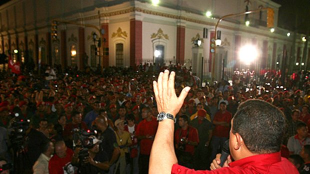Venezuelan President Hugo Chavez addresses supporters outside the presidential palace in the capital Caracas on Thursday night.