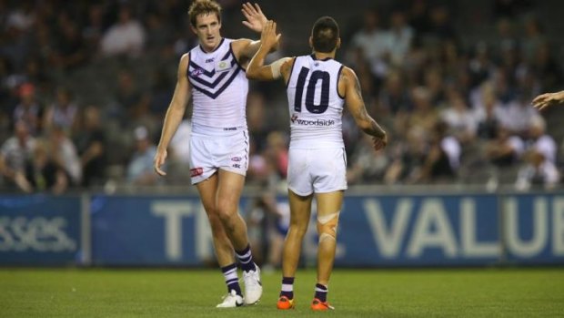 Michael Barlow will miss the next two games for Fremantle with a broken thumb.