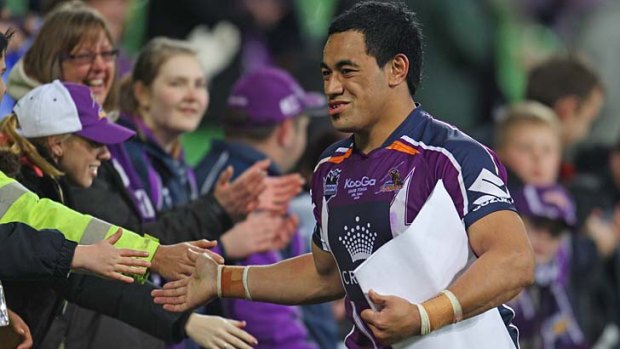 Mahe Fonua of the Storm celebrates with the crowd after the game.
