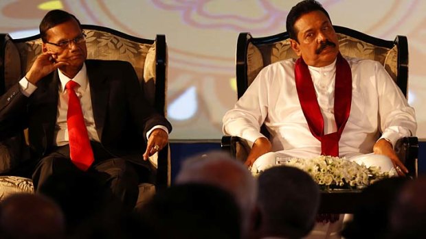Sri Lankan President Mahinda Rajapaksa, right, and Foreign Minister Gamini Lakshman Peiris. The biannual Commonwealth Heads of Government Meeting will take place from November 15-17,