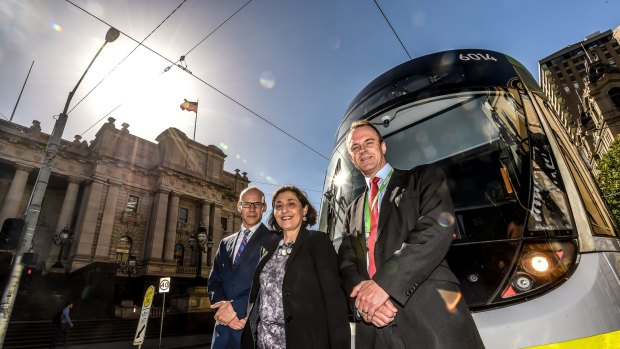 Energy Minister Lily D'Ambrosio with PTV chief executive Jeroen Weimar  (left) and Yarra Trams executive director Rob Robson.