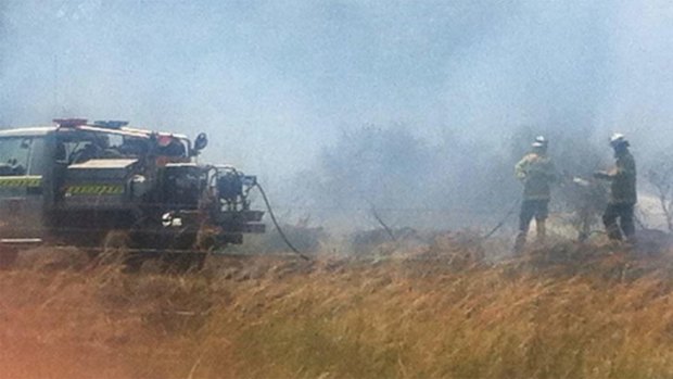 Firefighters tackle the Bullsbrook blaze. Photo courtesy of Channel Nine's @andrew_nelson9.