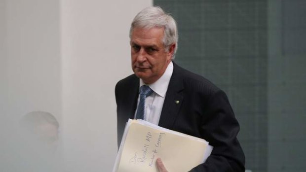 WA Liberal MP Don Randall: Repaying the money for his taxpayer-funded trip to Cairns.