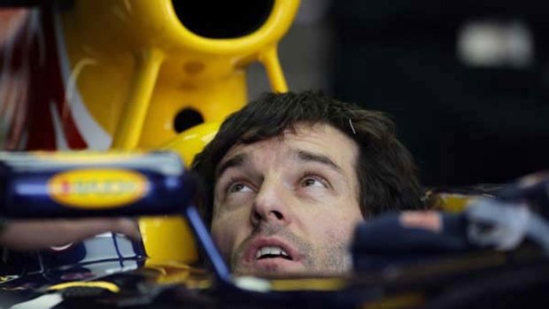 Australia's Mark Webber in his car ahead of practice.