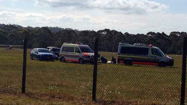 Shocking ... emergency services at Moruya airport Tuesday afternoon, amid reports a skydiver had died.