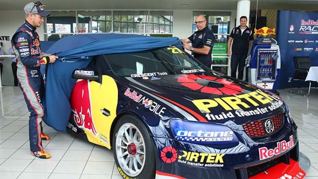 Here it is &#8230; Casey Stoner, left, unveils his Red Bull Holden for the second-tier V8 Supercars series.