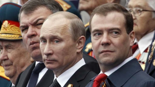 Job swap ... Russia's most powerful duo, Vladimir Putin and Dmitry Medvedev, right.