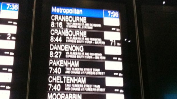 The board at Southern Cross Station shows a 71-minute wait for a Cranbourne train and a 33-minute wait for a Moorabbin train.