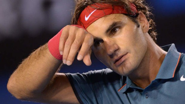 Tough night out: Switzerland's Roger Federer.