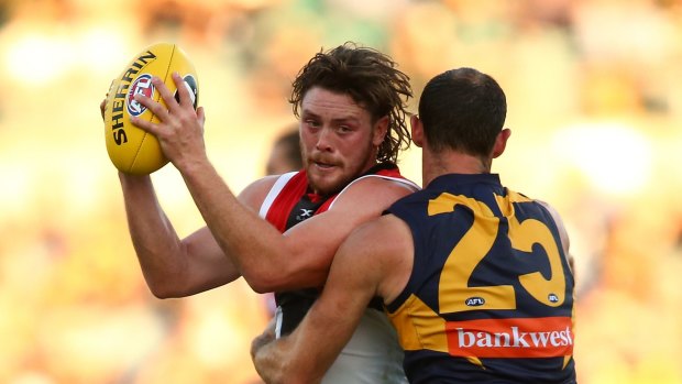 Jack Steven marks the ball against Shannon Hurn of the Eagles at Domain Stadium on Saturday.