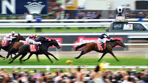 Green Moon winning the 2012 Melbourne Cup from Fiorente and Jakkalberry.