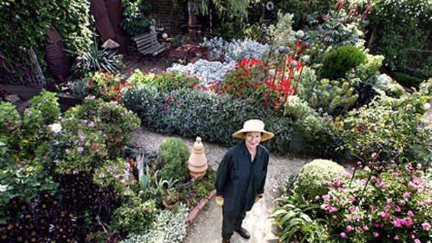 Proud water miser Nancy Brewer in the Ballarat garden that thrives on her ingenuity.