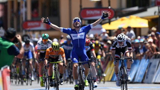 Big finish: Italian rider Elia Viviani celebrates winning stage three of the Tour Down Under.