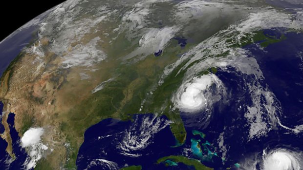 Tropical storm Hanna is just off the US coast, while hurricane Ike can be seen in the lower right.
