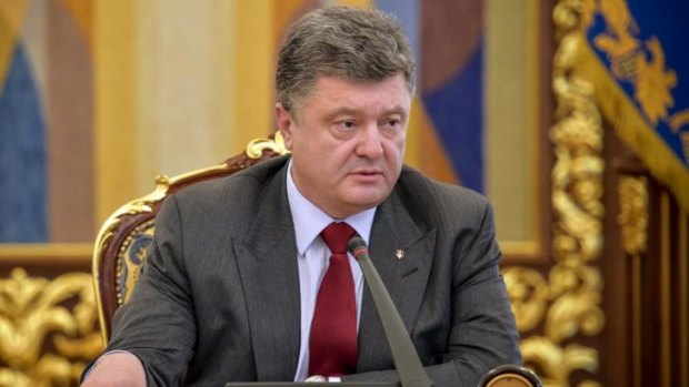 Ukrainian President Petro Poroshenko is frustrated that the world is slow to declare the Malaysia Airlines MH17 a 'terrorist act'.