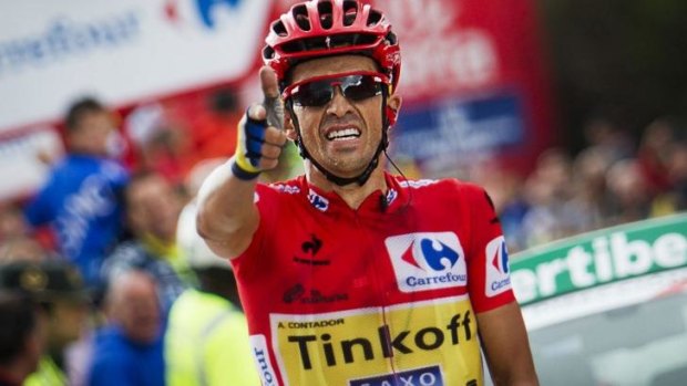 Alberto Contador celebrates as he wins the 16th stage.