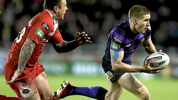 Worth top dollar: Wigan Warriors fullback Sam Tomkins shows why he's a wanted man against the Salford City Reds in the Super League earlier this year.