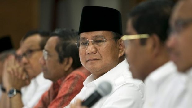 "I question the legitimacy of this process. It might lead to a situation where the process will be regarded as invalid": Prabowo Subianto, centre.