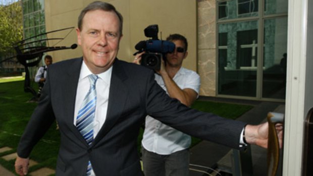 "I'm off" . . . Peter Costello leaving his final news conference at Parliament House yesterday.