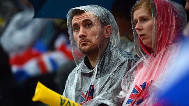 Soggy spectators at the Diamond League athletics meet at Crystal Palace in London on Friday.