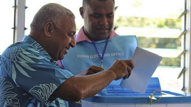 Heading for victory: Frank Bainimarama votes in Suva in Wednesday's election.