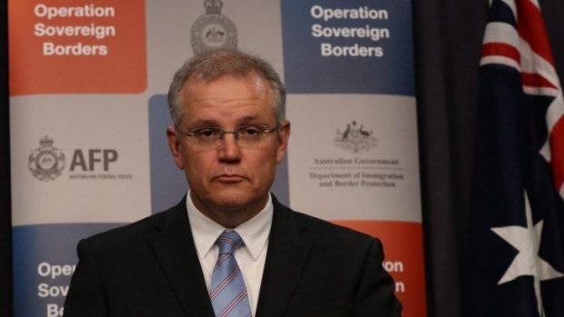 Hard line ... Immigration Minister Scott Morrison can expect questions about whether the Australian navy loaded three asylum seekers from a boat that was turned around in February.  