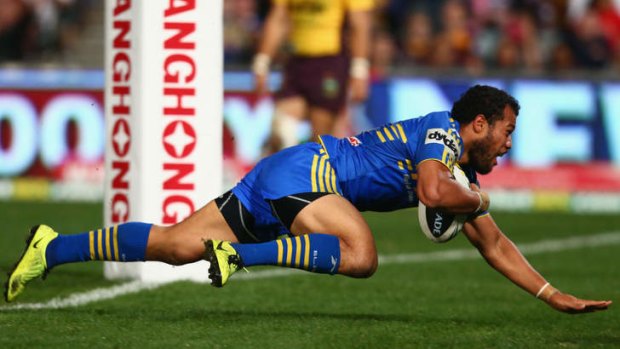 Support play: Joseph Paulo scores a try for Eels on the back of some creative magic from playmaker Chris Sandow.